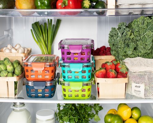 Organized food containers in a clean refrigerator